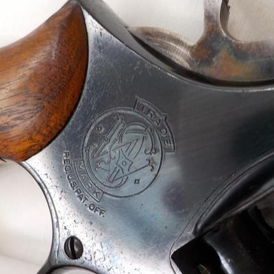 Police Chief S & W 38 special snub nose revolver. Est. $200 to $600.