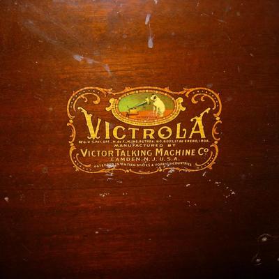 Antique Victrola Cabinet turned into storage unit.