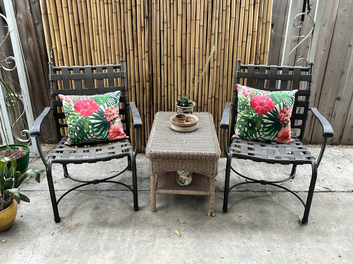 Pair of Metal Patio Chairs with Woven Outdoor Faux Wicker Rattan Table &  Colorful Pillows *OFF SITE PICK UP* | EstateSales.org