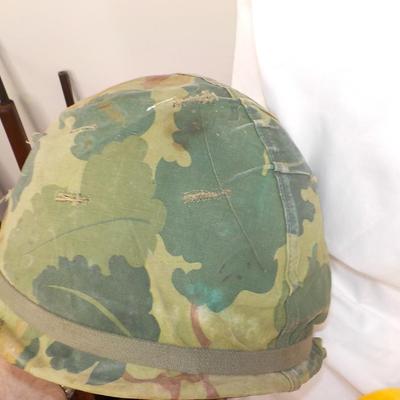 Viet Nam Era  Helmet belong to Gunny Sergeant Magee.