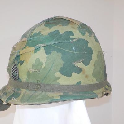 Viet Nam Era  Helmet belong to Gunny Sergeant Magee.