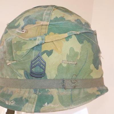 Viet Nam Era  Helmet belong to Gunny Sergeant Magee.