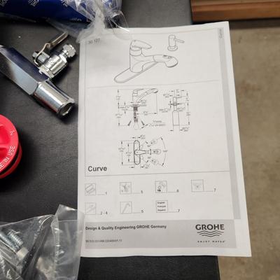 Table lot of Kitchen Plumbing , Soap Dispenser, Grohe Faucet & more