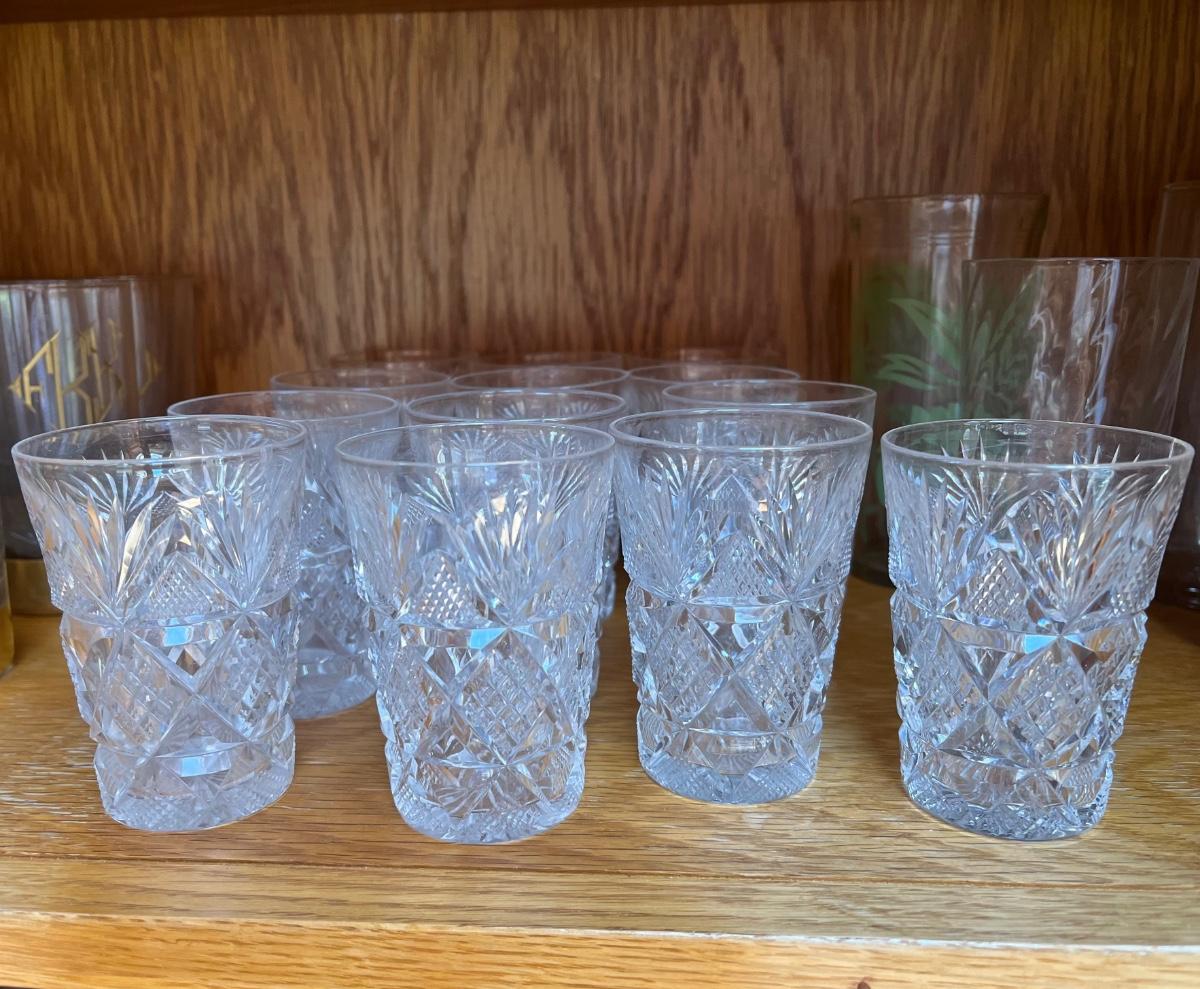 14 small crystal glasses