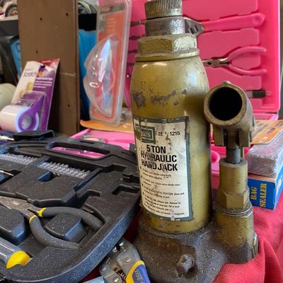 Hydraulic Jack , Vintage family Motors sign, hand tools