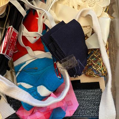 Plastic box of sewing items