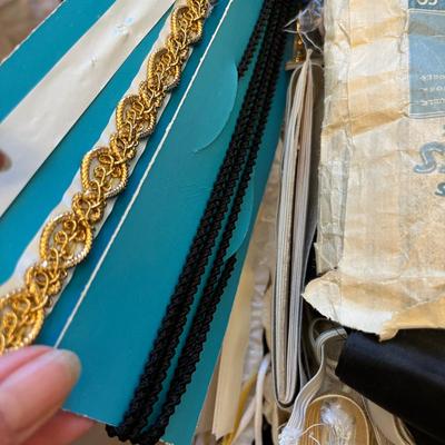 Plastic box of sewing items