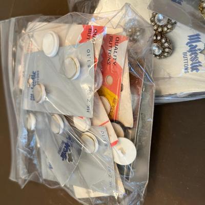 Buttons, fancies
