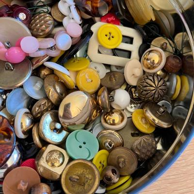 Tin of buttons