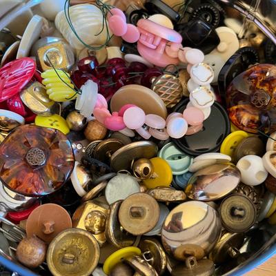 Tin of buttons