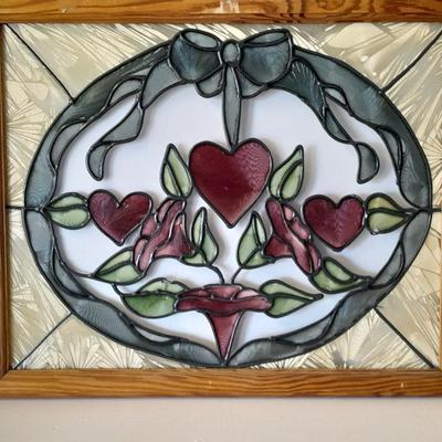 Framed window suncatcher and two red glass vases