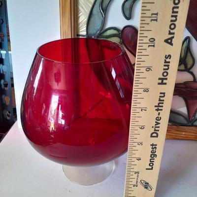 Framed window suncatcher and two red glass vases