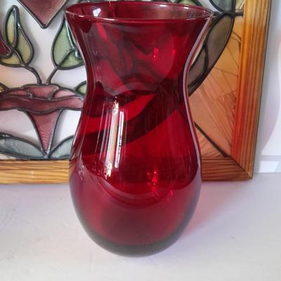 Framed window suncatcher and two red glass vases