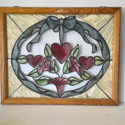 Framed window suncatcher and two red glass vases