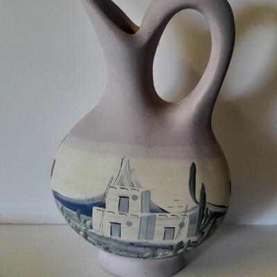 Tall Ceramic vase with matching ceramic decorative plate