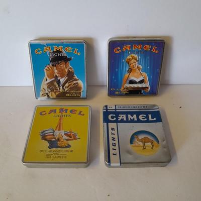 Four vintage Camel Cigarette metal tins