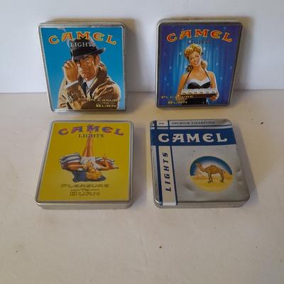 Four vintage Camel Cigarette metal tins