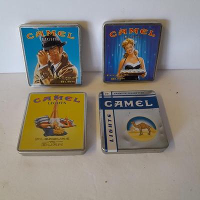 Four vintage Camel Cigarette metal tins