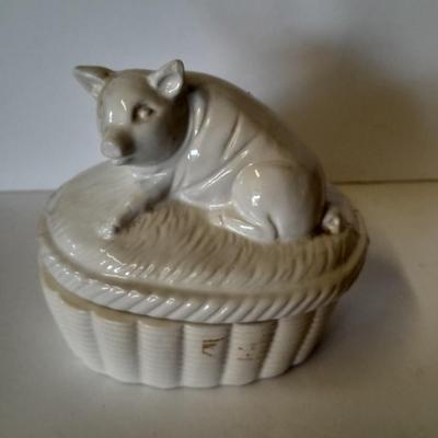Pitcher with bowl and collectible pig figures