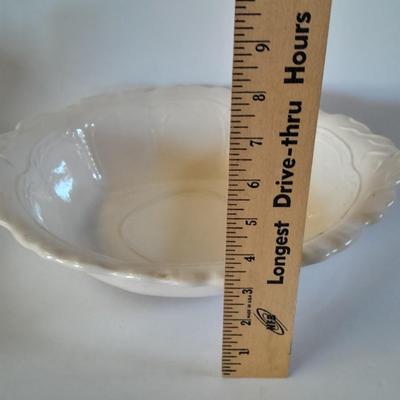 Pitcher with bowl and collectible pig figures