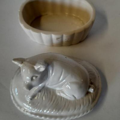Pitcher with bowl and collectible pig figures