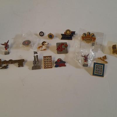Assortment of hat pins - New York, stamp replica's and more