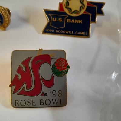 Assortment of hat pins - New York, stamp replica's and more