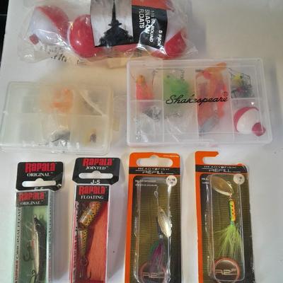Assortment of Fishing lures new in boxes and other fishing tackle. Rapala Lures