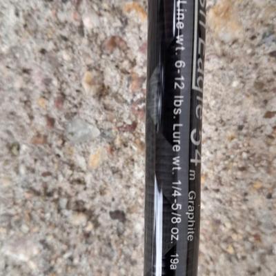 BRAND NEW FISHING POLE AND REEL New Cabela's Fish Eagle 6'6" Spinning rod with new Pflueger open face reel
