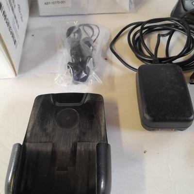 Two older Blackberry Phones with accessories