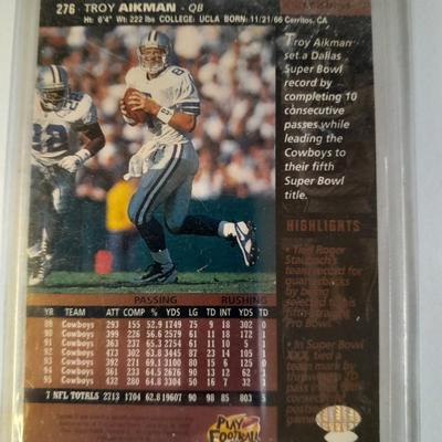 Two Troy Aikman Quarterback trading cards