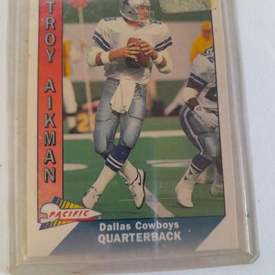 Two Troy Aikman Quarterback trading cards