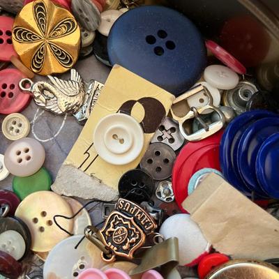 Tin of buttons