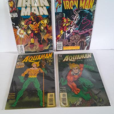 Four Iron Man comic books