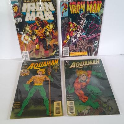 Four Iron Man comic books
