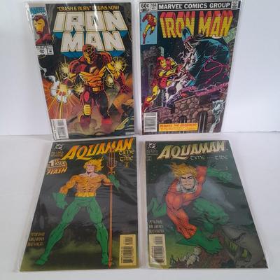 Four Iron Man comic books