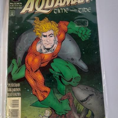 Four Iron Man comic books