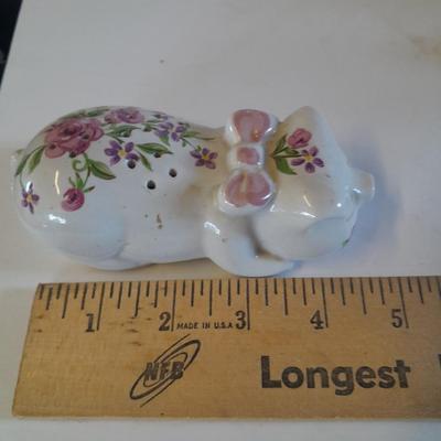 Framed wall art, vase with faux flowers, and pig figures -- piggy bank