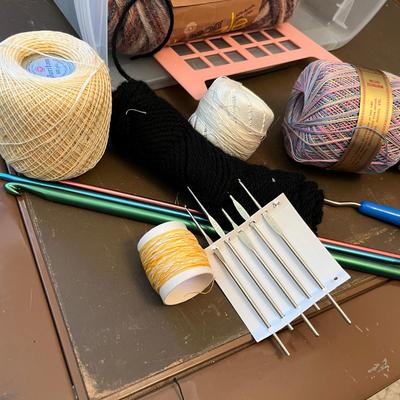 Yarn, needles, & embroidery floss.