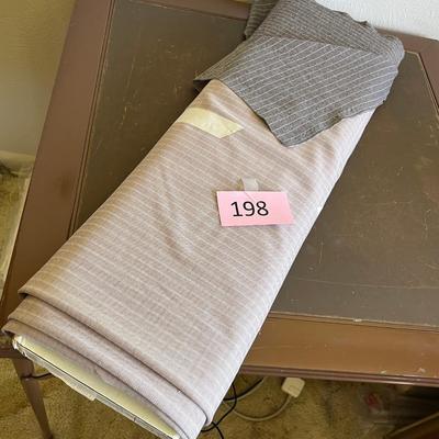 Bolt of gray fabric
