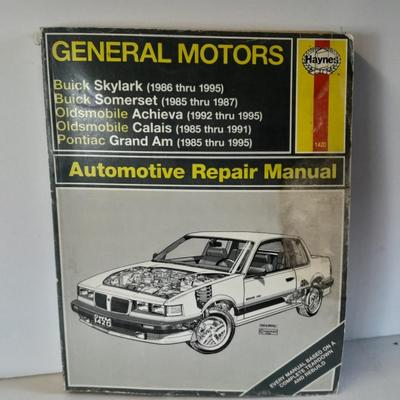 Two auto mechanic books, Chilton's manuals, GM X-Body and Buick skylark, Oldsmobile, and others