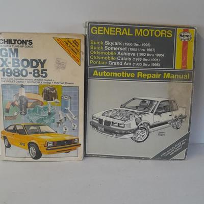 Two auto mechanic books, Chilton's manuals, GM X-Body and Buick skylark, Oldsmobile, and others
