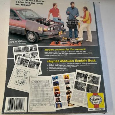 Two auto mechanic books, Chilton's manuals, GM X-Body and Buick skylark, Oldsmobile, and others