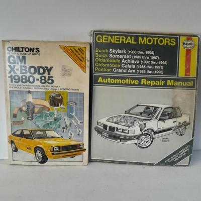 Two auto mechanic books, Chilton's manuals, GM X-Body and Buick skylark, Oldsmobile, and others