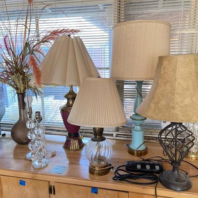Table, lamps, and vase
