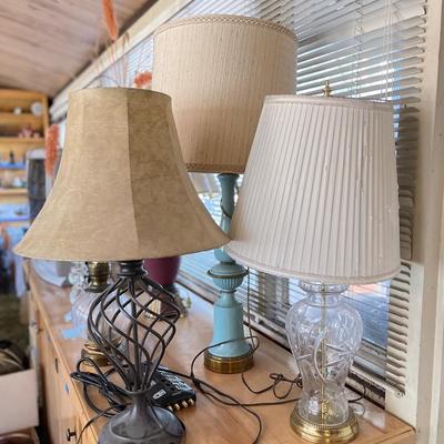 Table, lamps, and vase