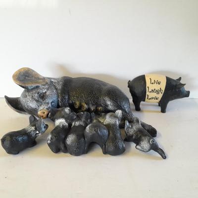 Mother pig figure with little babies and a live laugh love pig figure