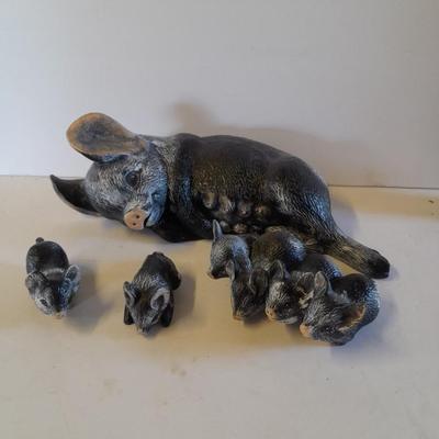 Mother pig figure with little babies and a live laugh love pig figure