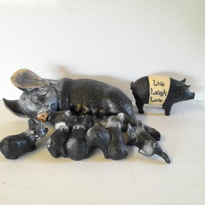 Mother pig figure with little babies and a live laugh love pig figure