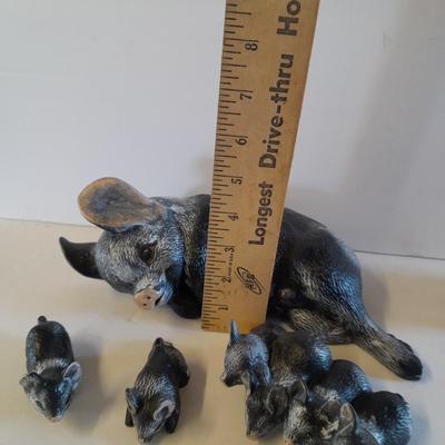 Mother pig figure with little babies and a live laugh love pig figure